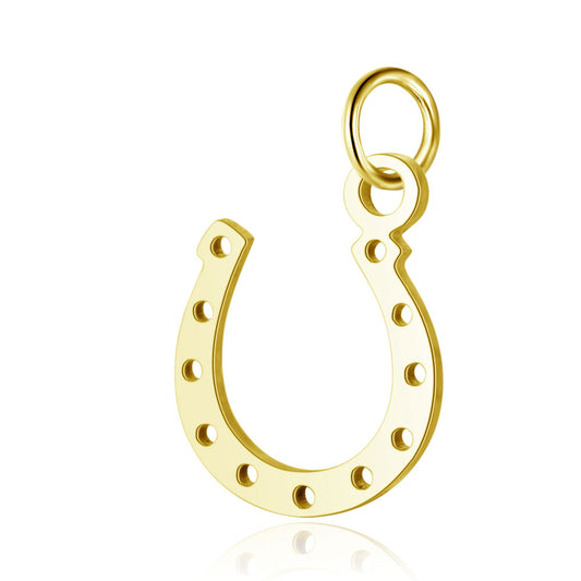 Gold horseshoe good luck charm