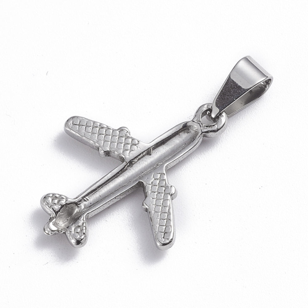 Silver aeroplane charm