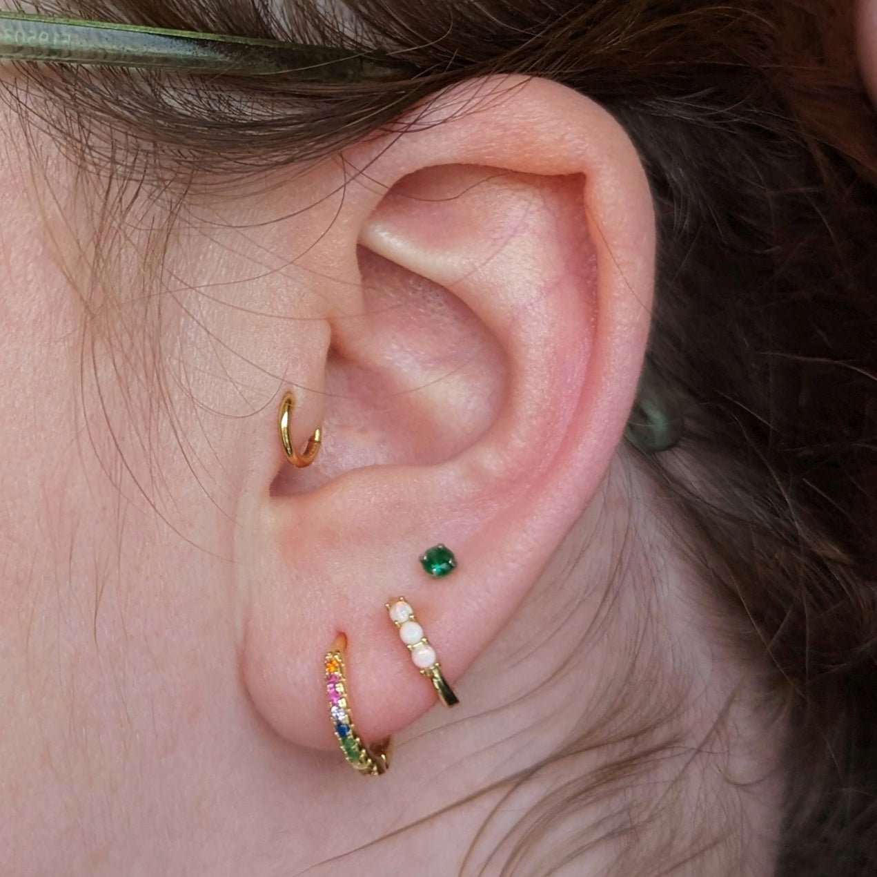 Gold rainbow huggie hoop earrings - M. Elizabeth Jewellery