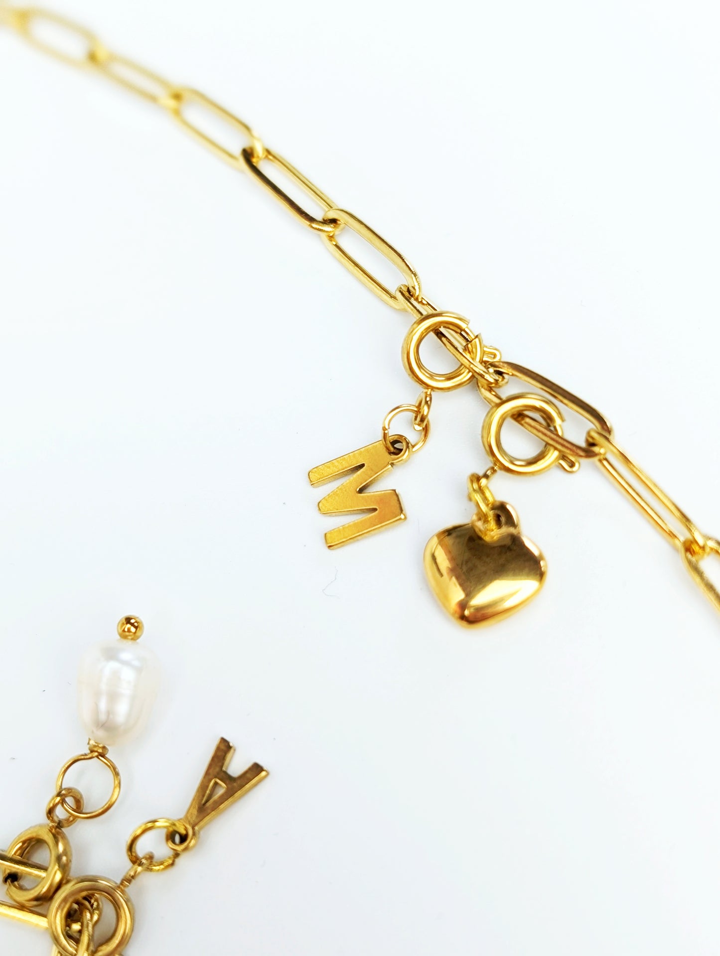 Gold initial letter charm